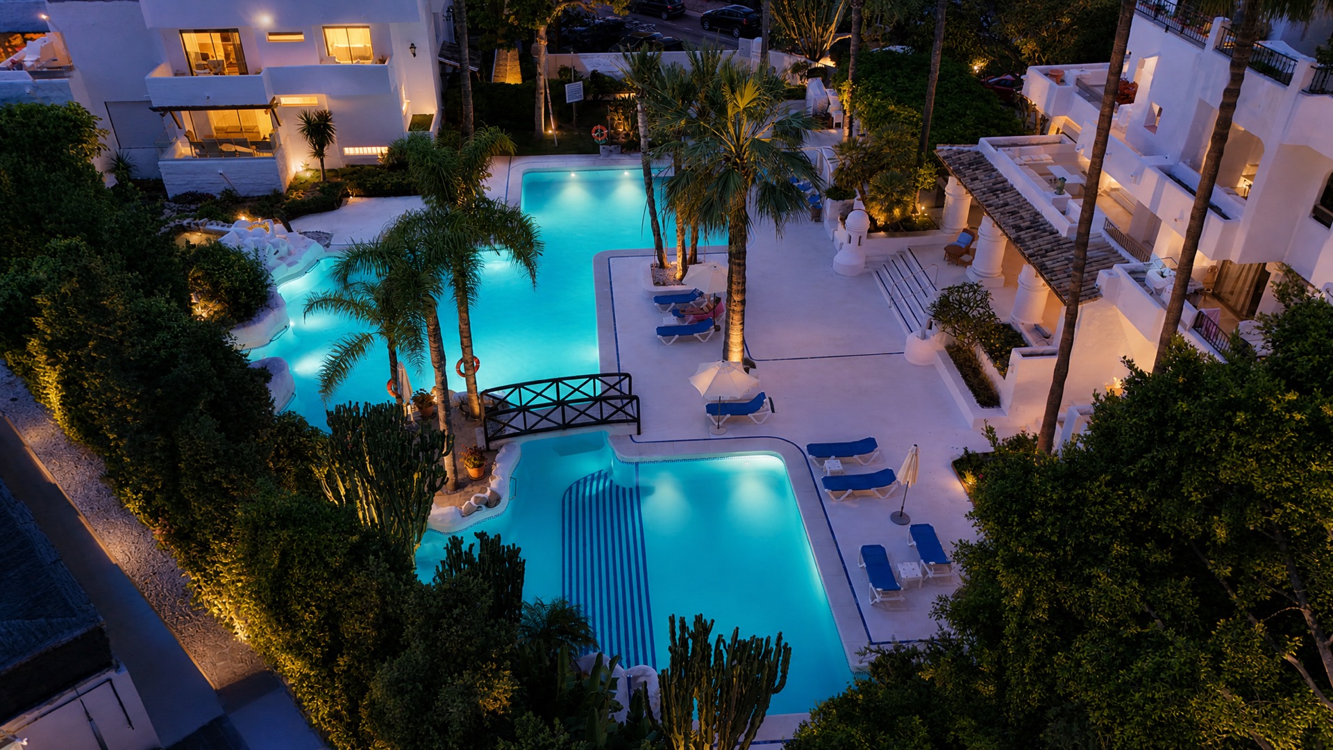 Communal pool dusk at the La Isla penthouse
