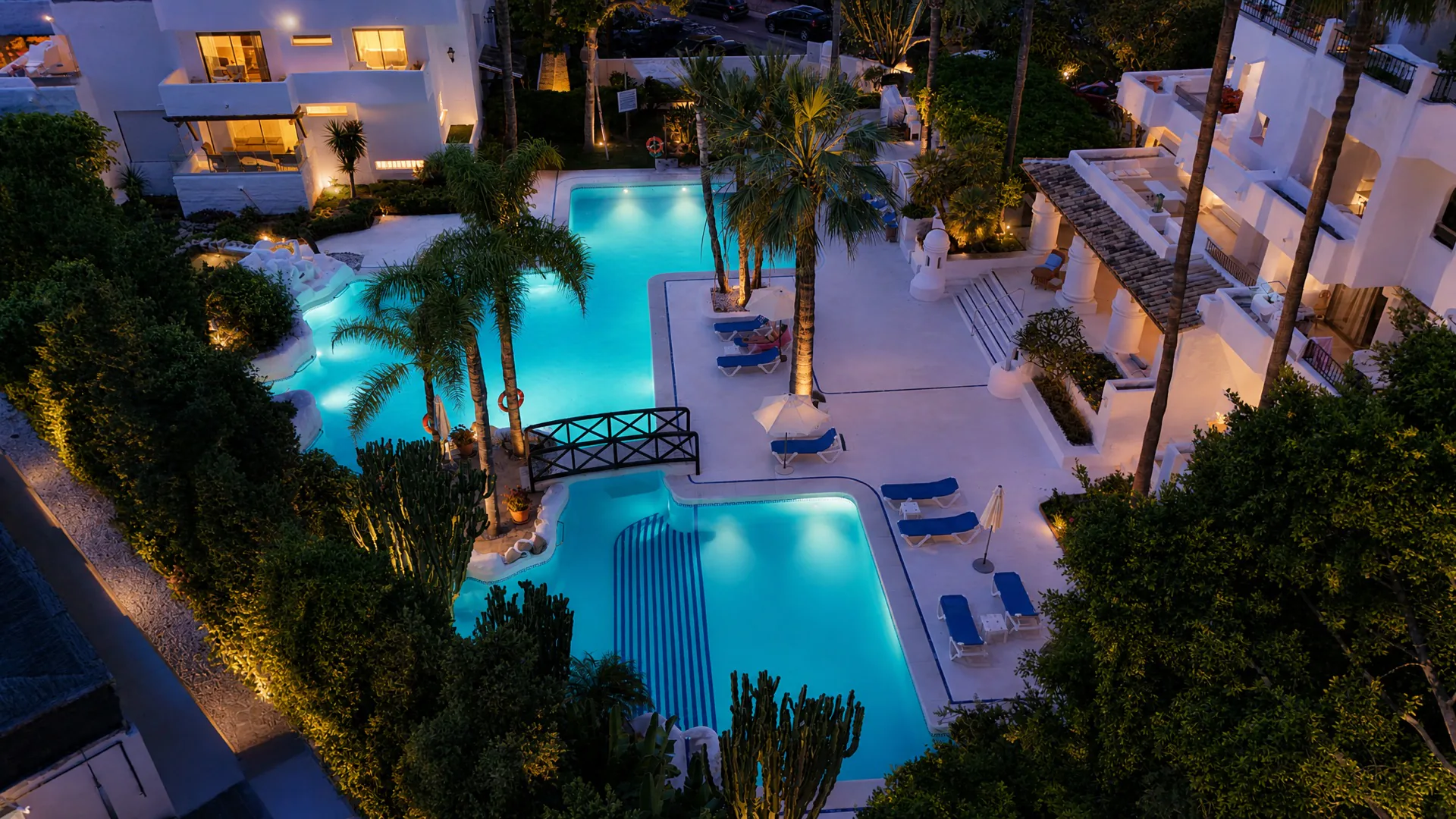 Communal pool dusk at the La Isla penthouse