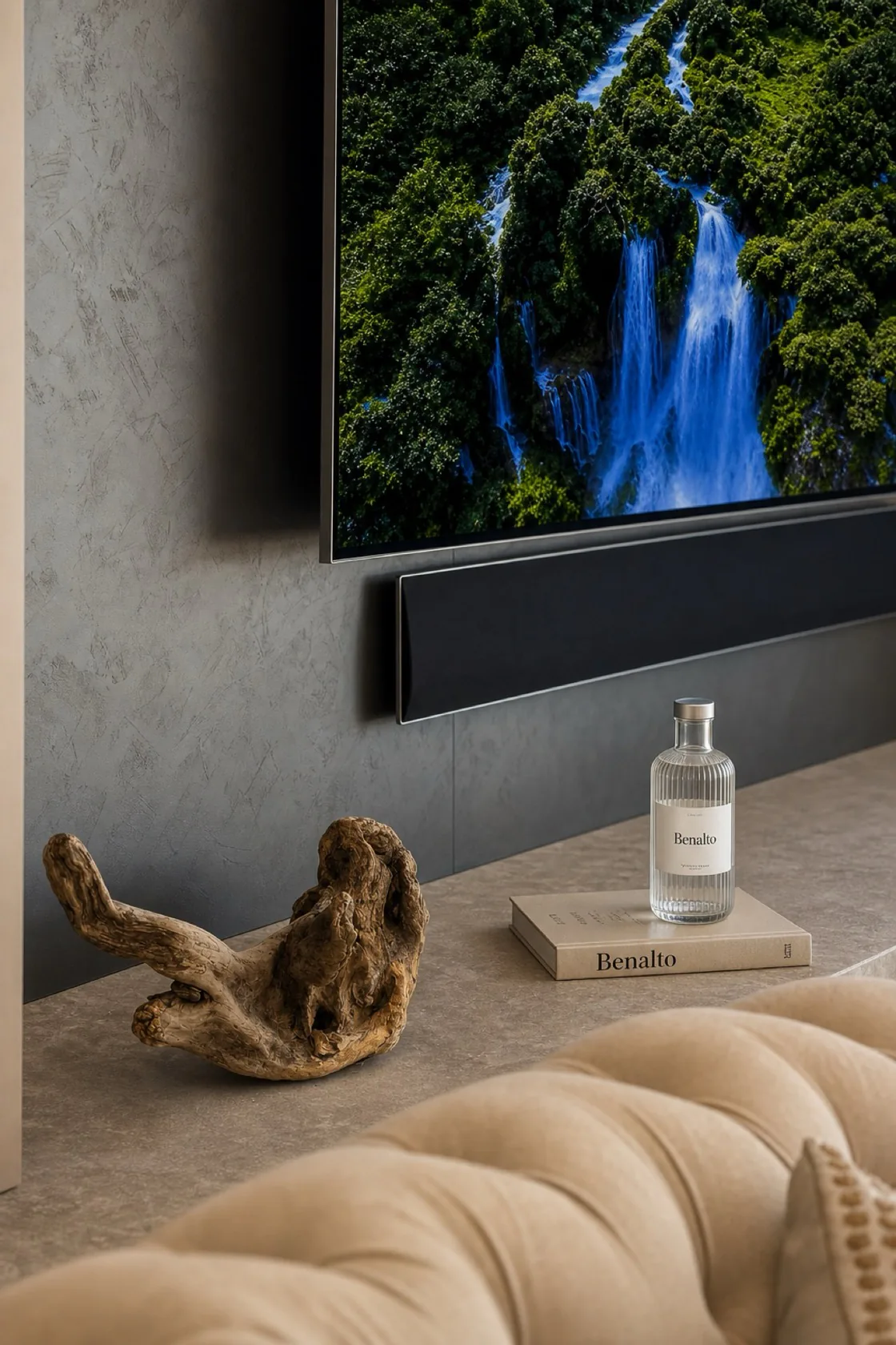 Stone console with driftwood and books in the living room of the La Isla penthouse