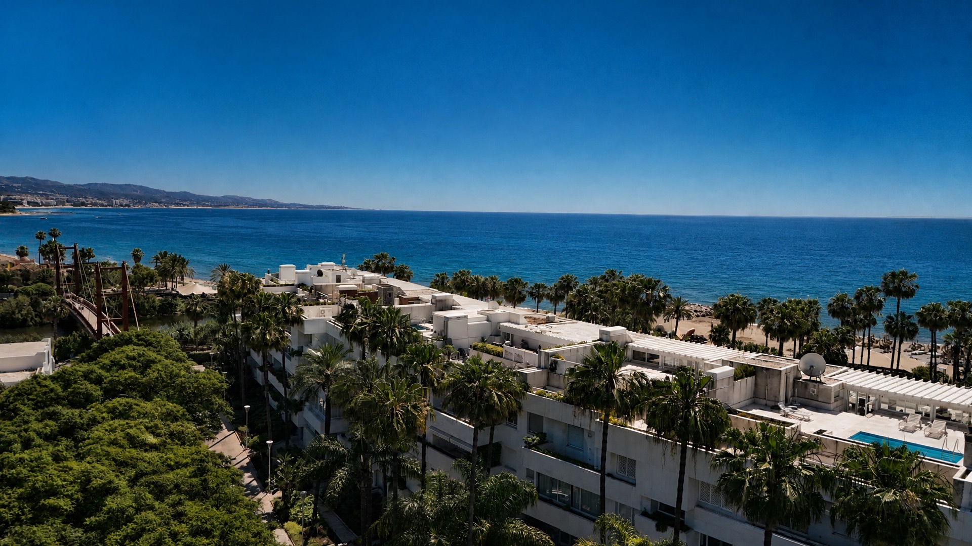 Aerial seafront complex beach view at the La Isla penthouse
