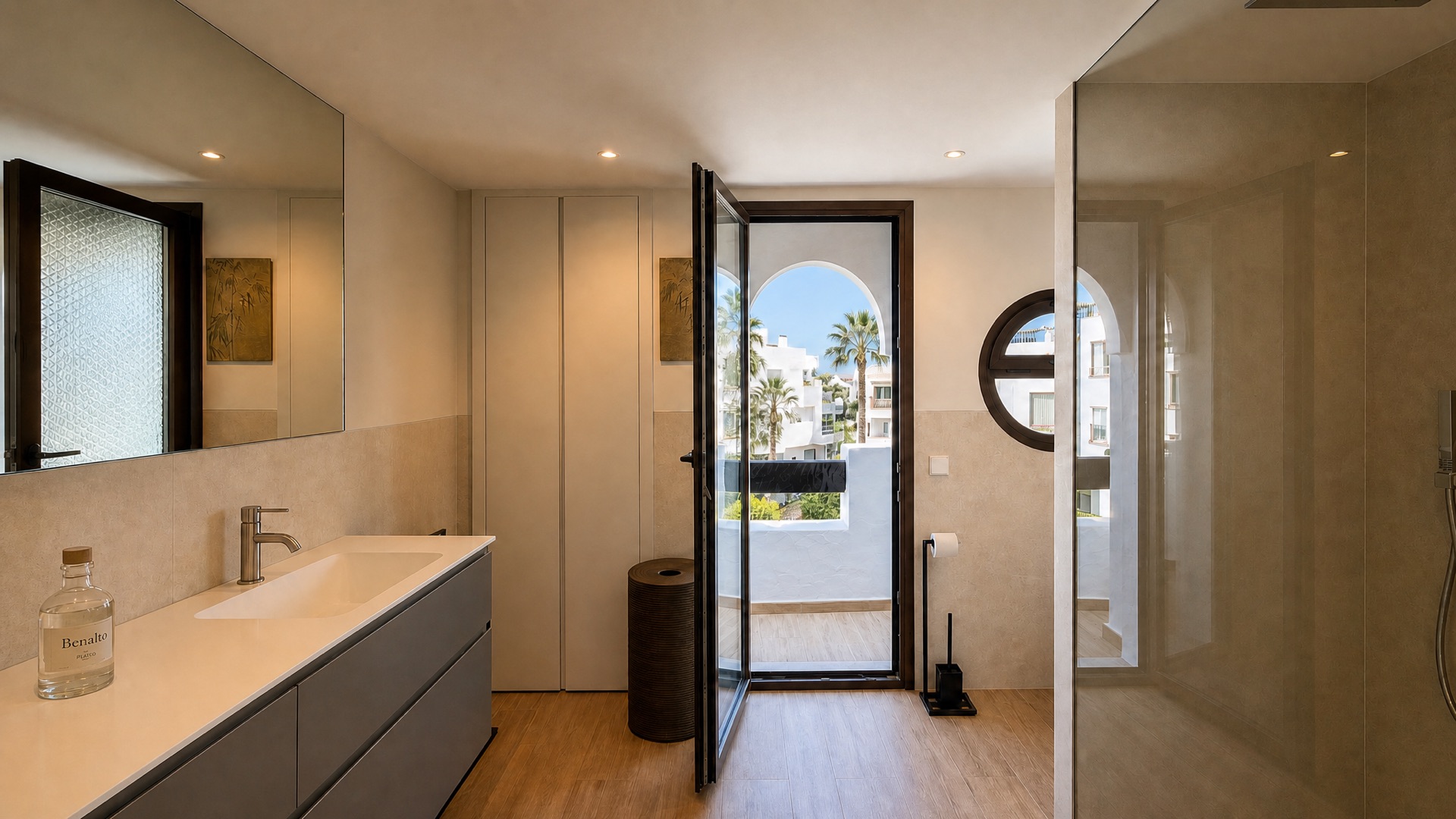 Modern master bathroom with balcony at the La Isla penthouse