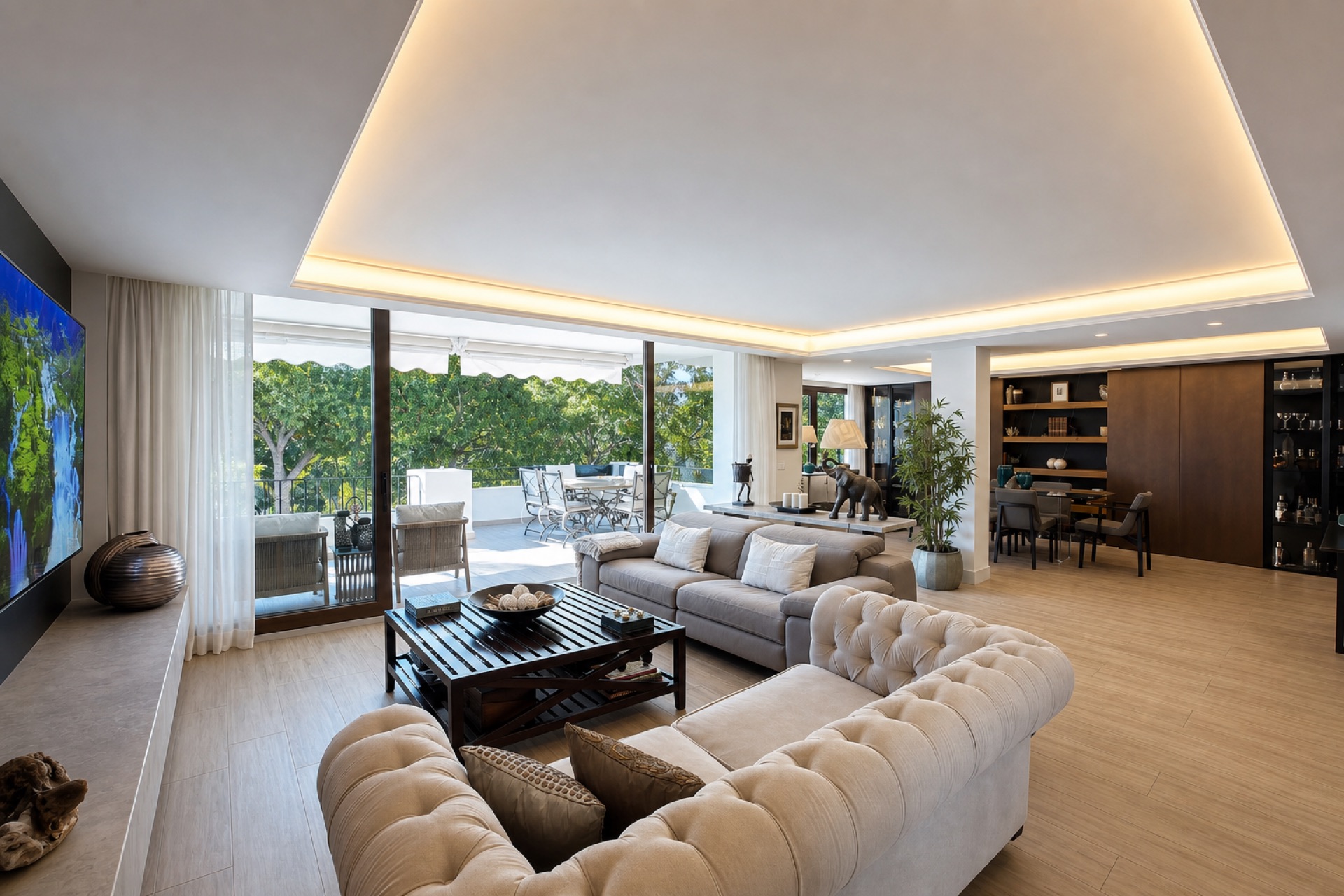 Bright living room with terrace at the La Isla penthouse