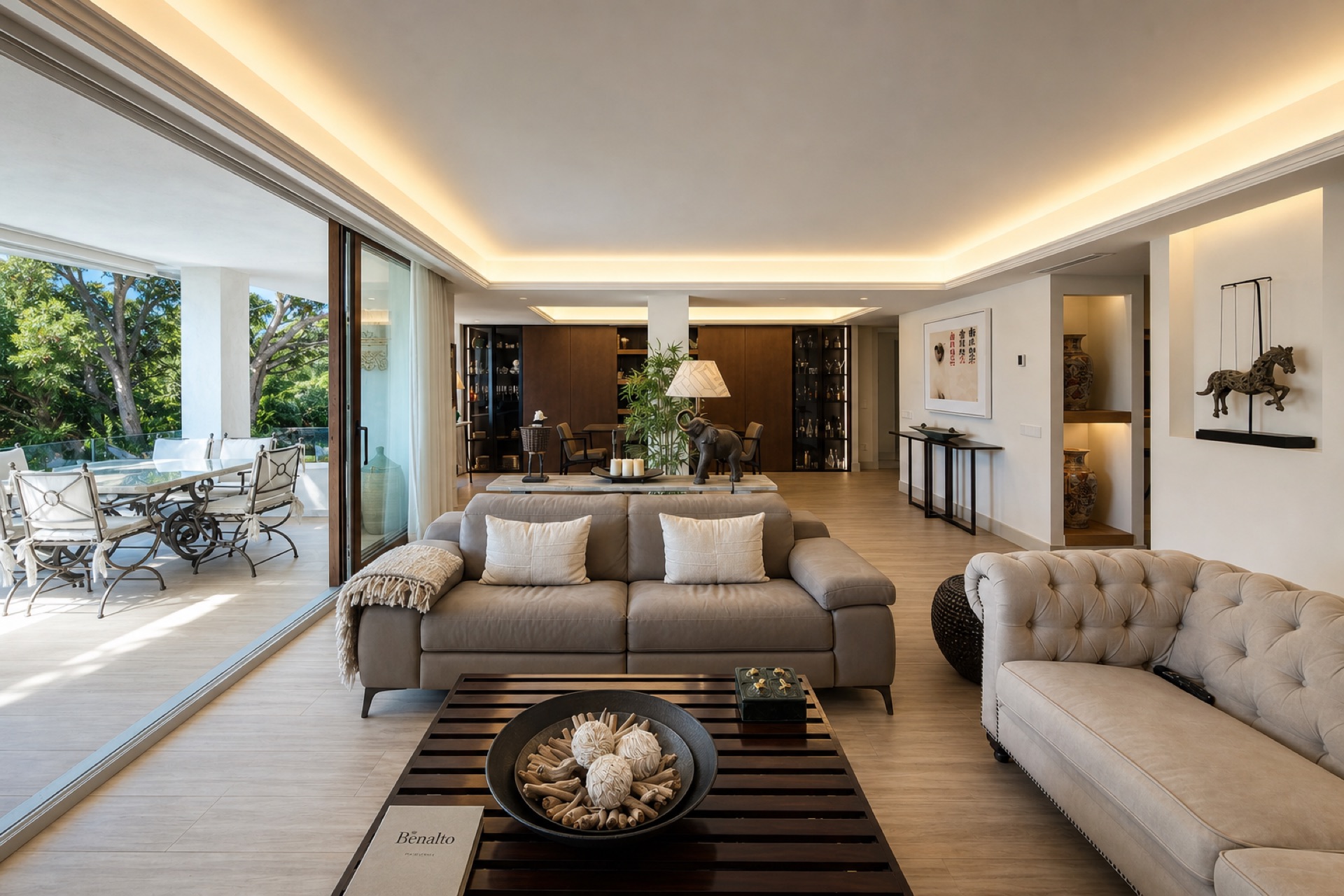 The open-plan living room opening to the terrace