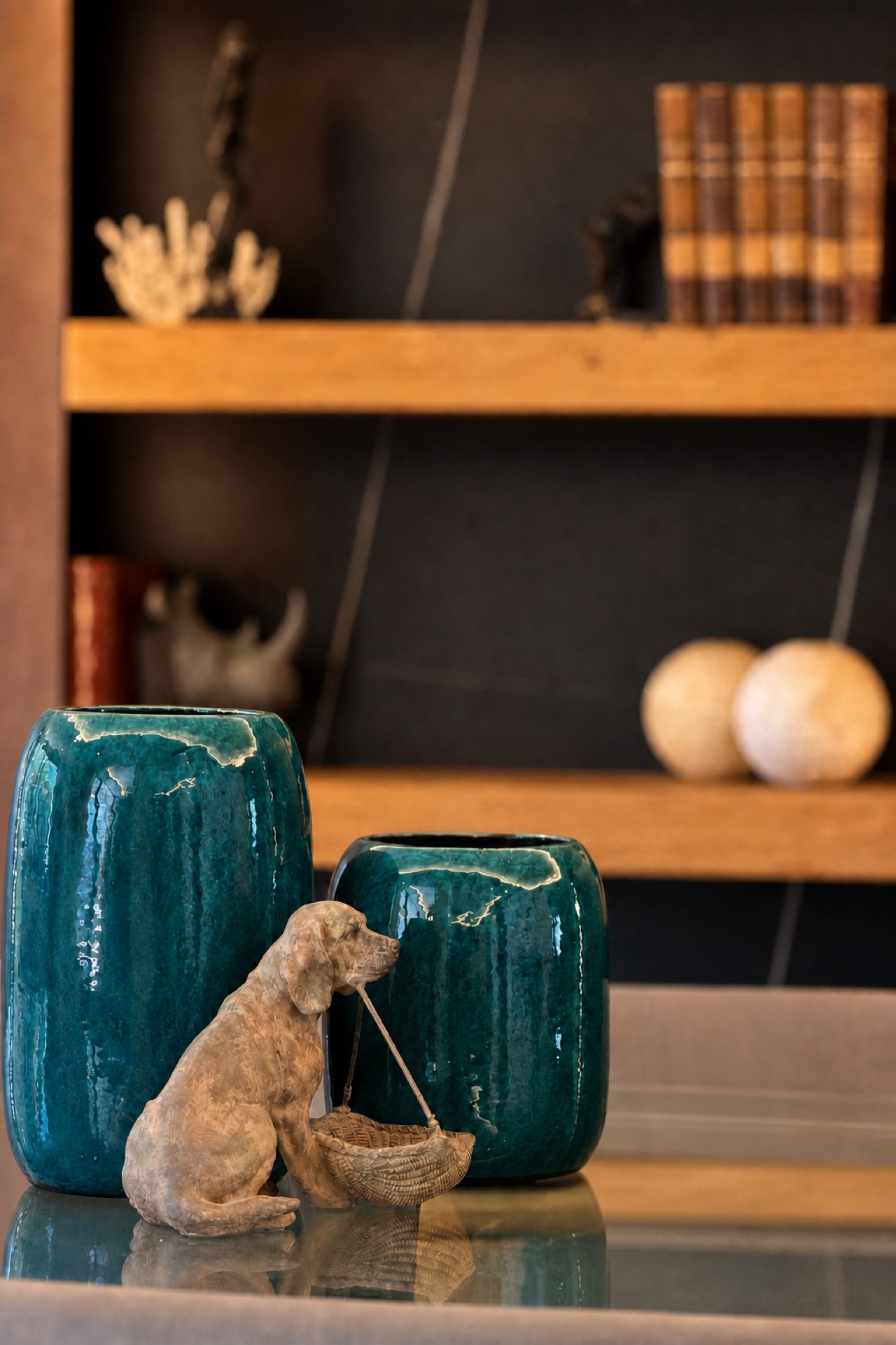 Decorative vases and figurine detail at the La Isla penthouse