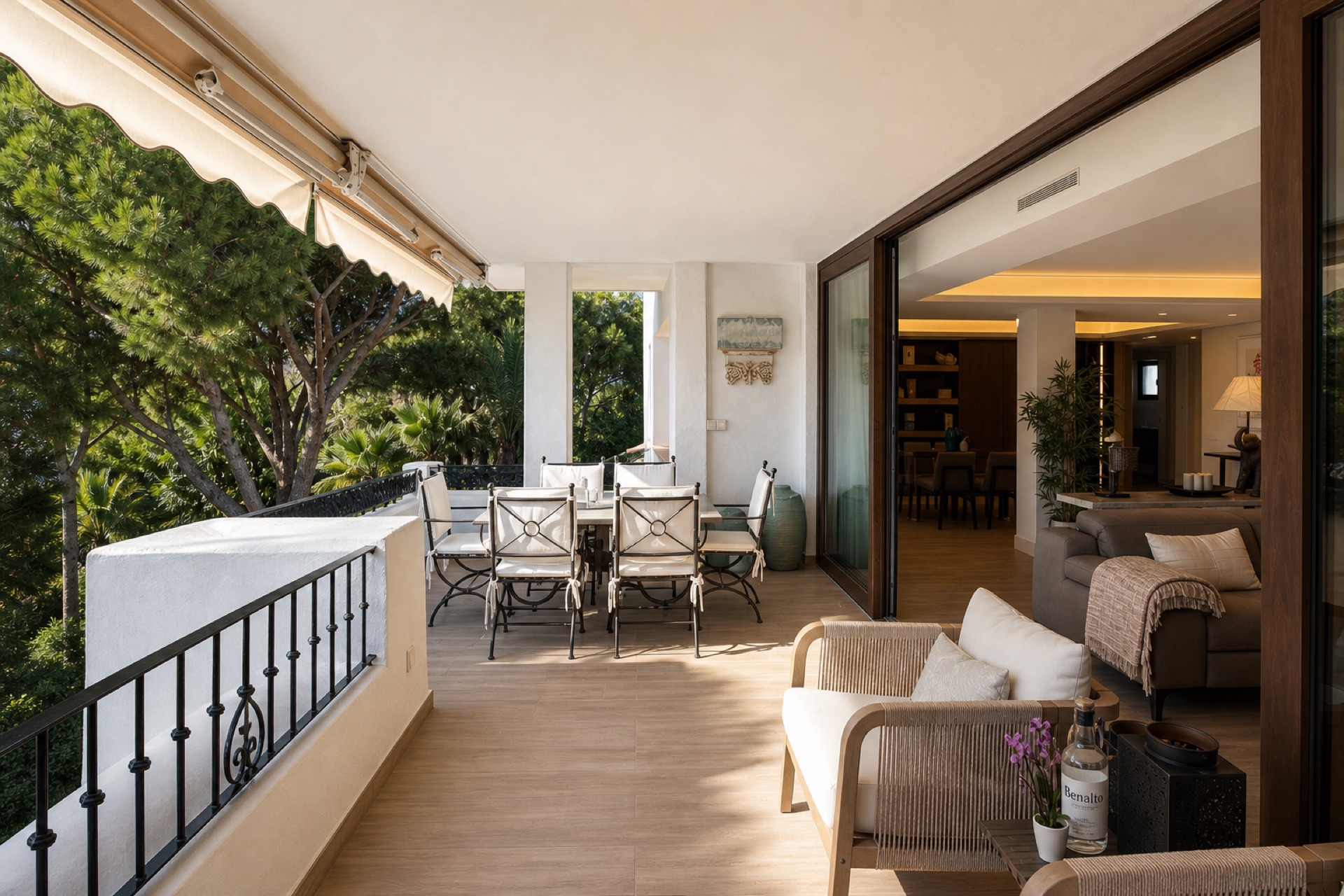 Covered terrace with dining area at the La Isla penthouse