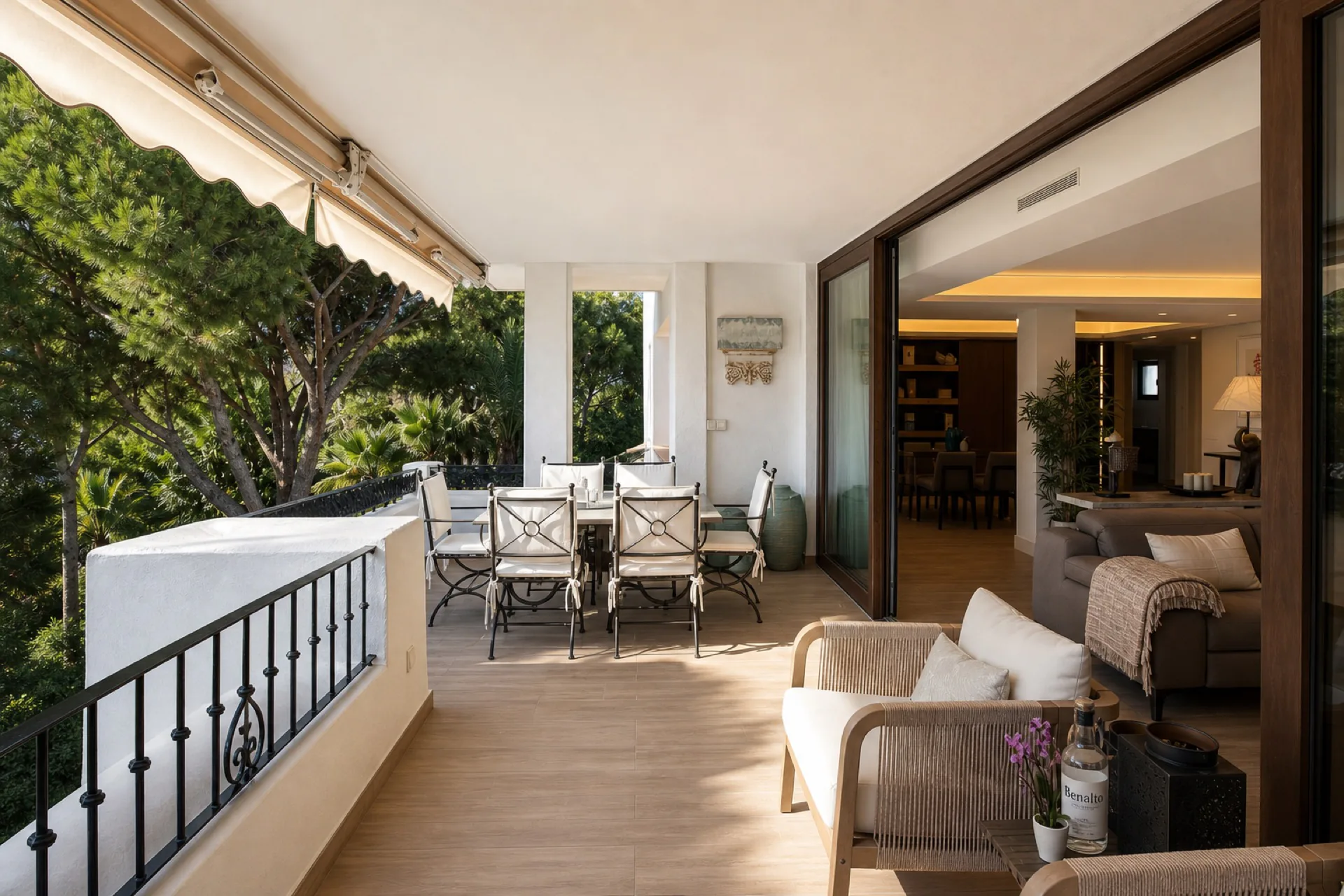 Covered terrace with dining area at the La Isla penthouse