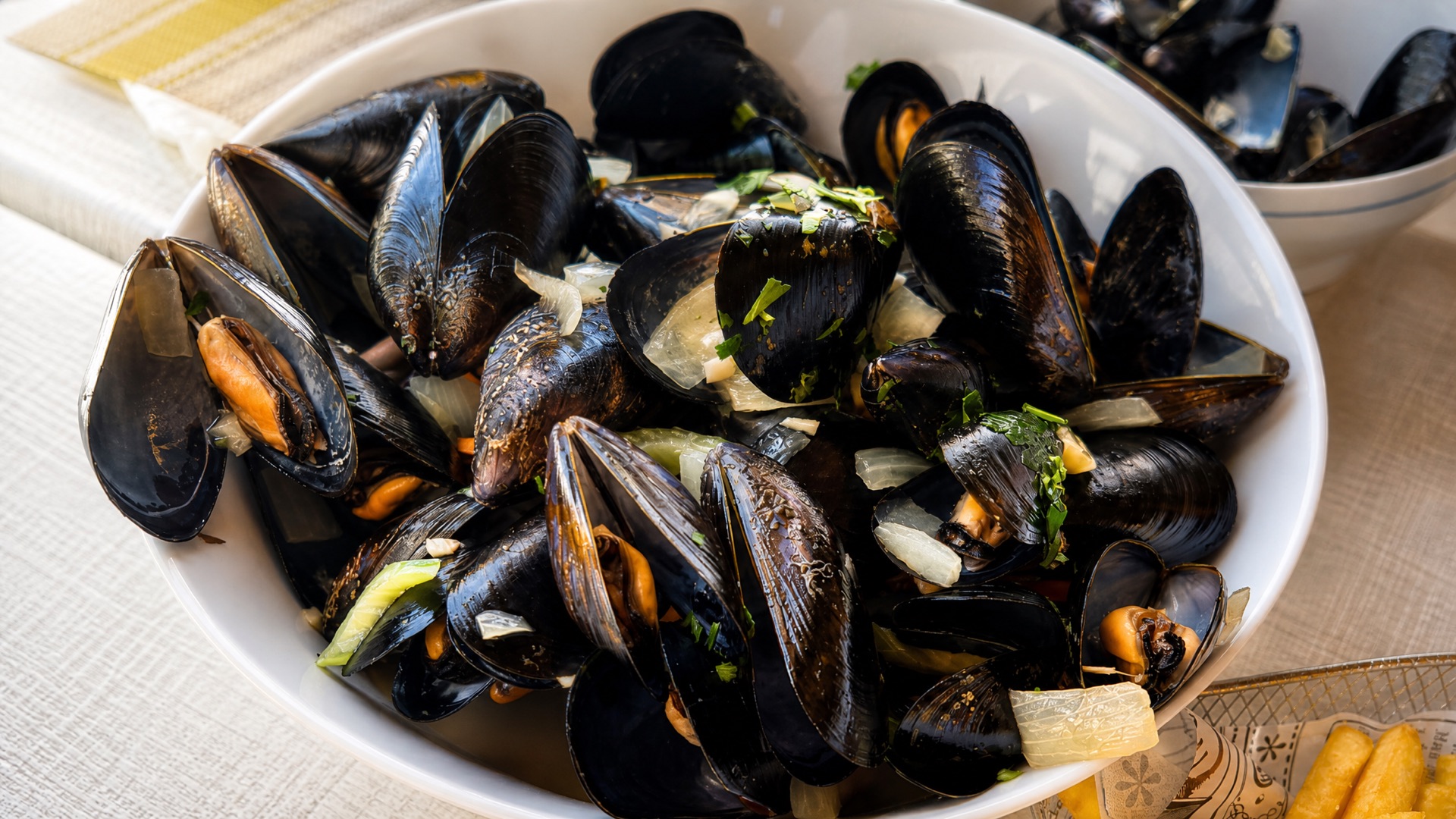 Mussels white bowl closeup at the La Isla penthouse