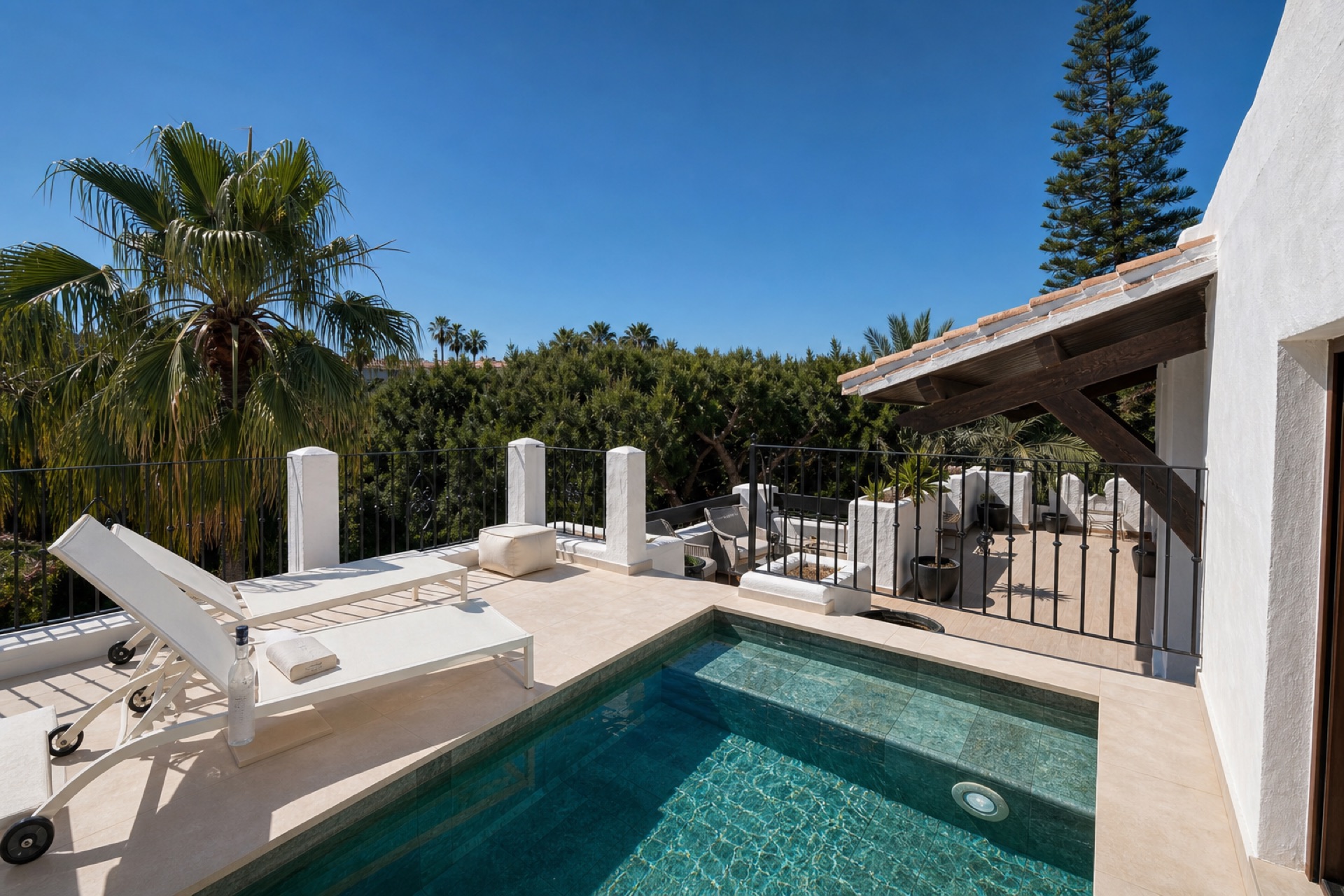 The green-stone plunge pool on the private terrace