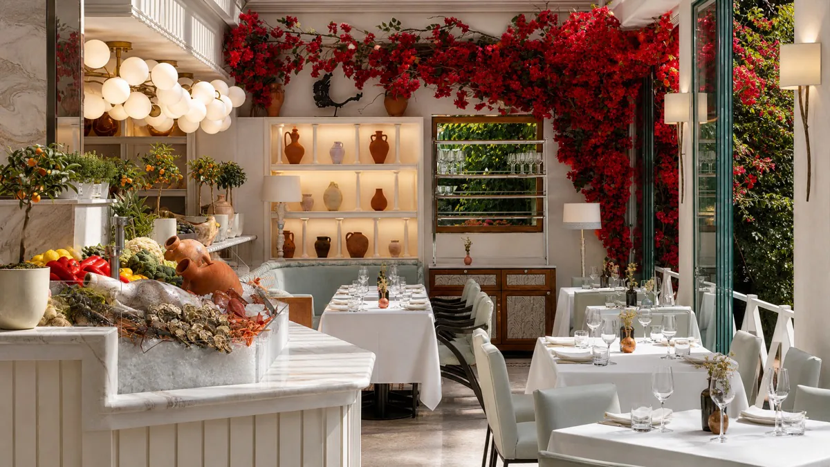 The dining room at Puente Romano, with bougainvillea over the terrace