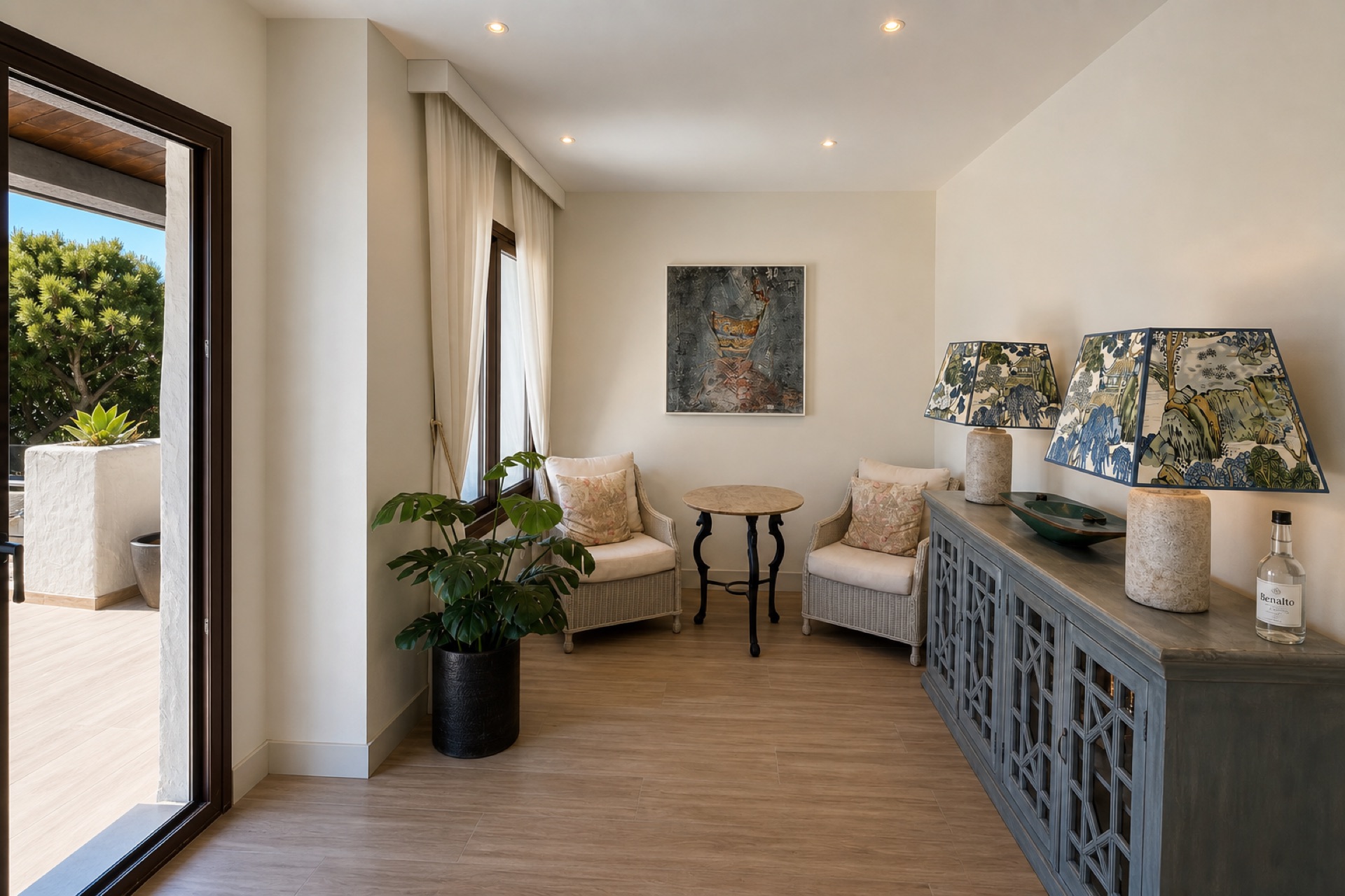 Cozy sitting area with terrace access at the La Isla penthouse