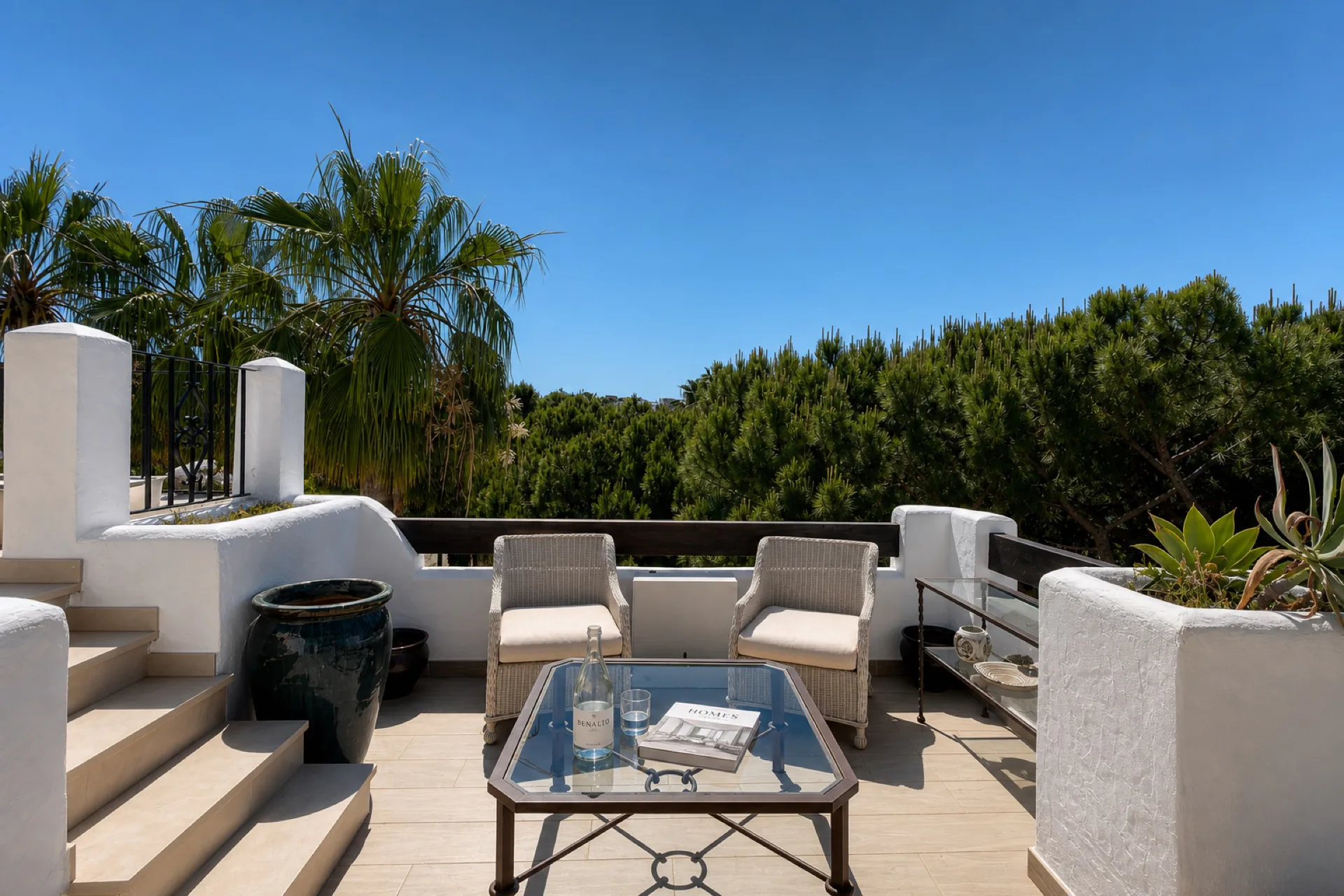 Private terrace with seating at the La Isla penthouse
