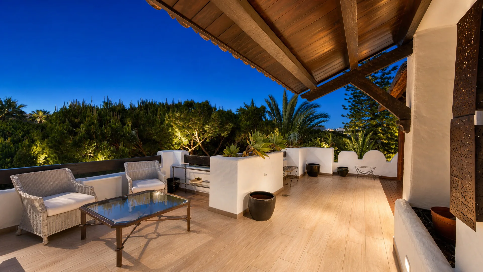 The private terrace of the master level at dusk