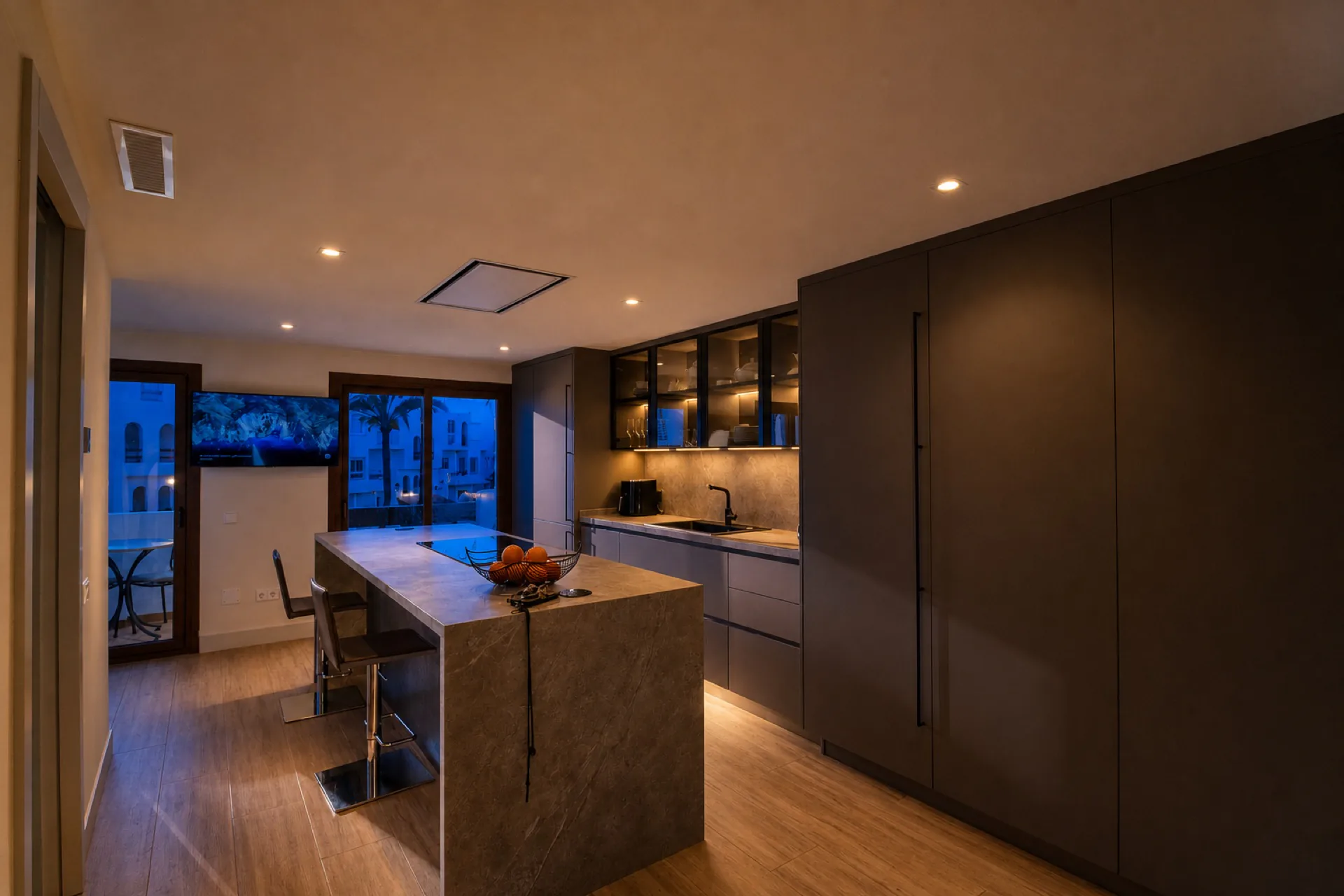 Modern kitchen with island at the La Isla penthouse