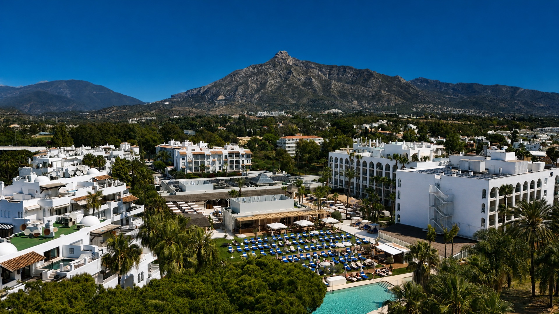 Community pool and mountain views at the La Isla penthouse